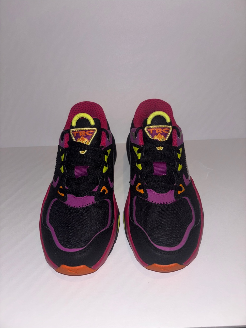 Puma Woman’s Black, Purple & Yellow Accent Sneaker